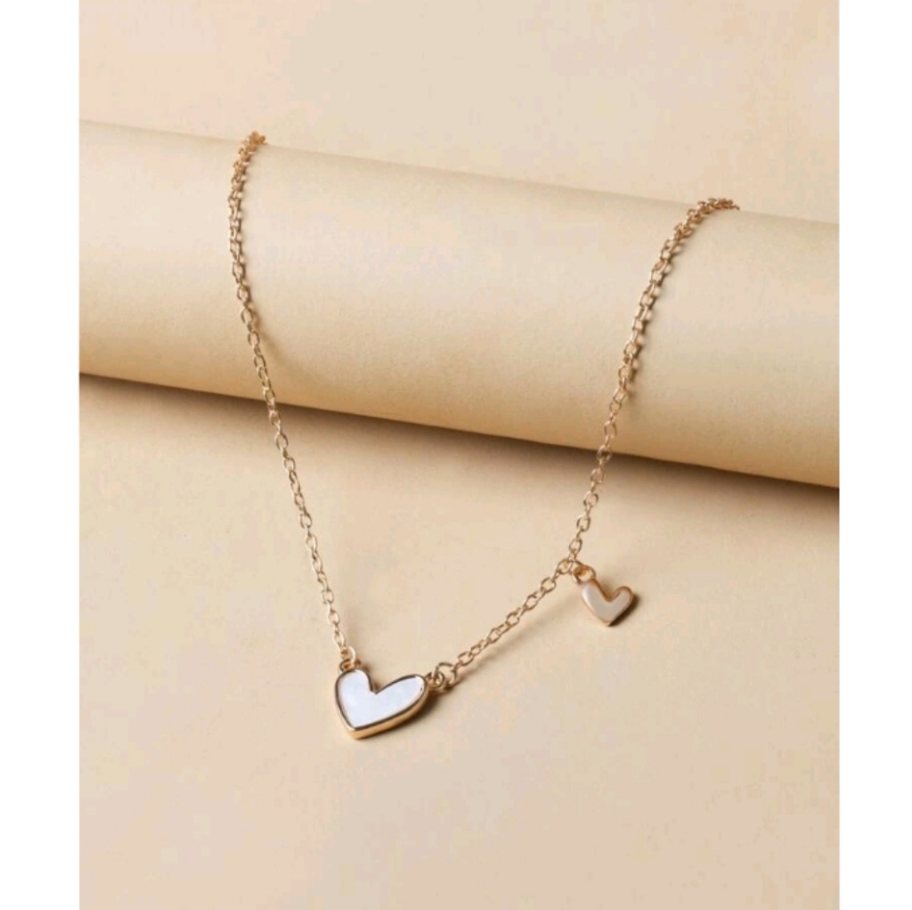 Anthropologie Gold Necklace with White Heart Charms